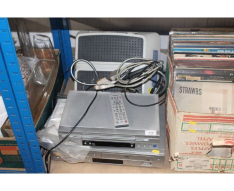 A LG VHS player, a Samsung VHS player and a foot circulation machine
