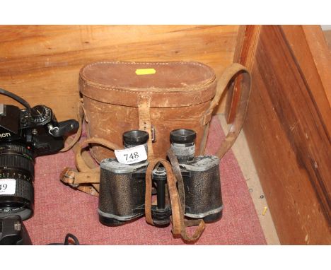 A pair of Carl Zeiss 6x30 binoculars in case