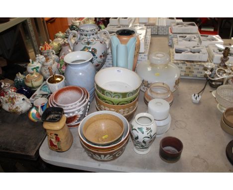 A collection of various Studio Pottery to include Holkham pottery bowl, Portmeirion 'Botanic Garden' vase, a twin handled flo