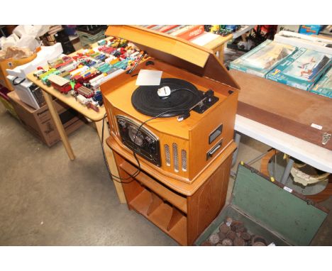 A record player together with a record cabinet