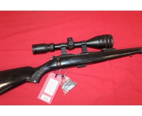 A .22 rim fire Cal. bolt action rifle by Brno (model 2) with spare magazine, 4-12x50 scope and cut for moderator. Ser. No.209