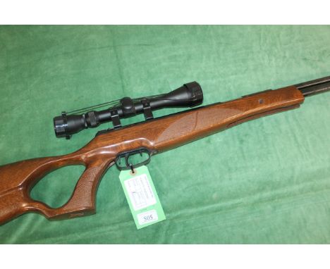 A Remington War Hawk .22 Cal. underlever air rifle with 3-9x40 scope. As a post 1939 air weapon the restrictions of the crime