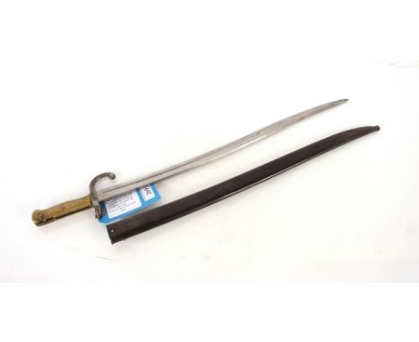 A fine French M1866 brass hilted bayonet dated 1874 with matching numbered scabbard. This item can only be purchased by someo