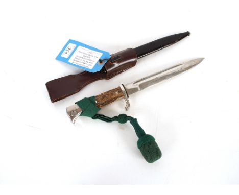 A German Parade bayonet by Puma Solingen with leather frog and knot. This item can only be purchased by someone over the age 