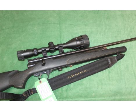 A S.M.K. X578 Co2 bolt action .22 Cal. air rifle with 4-12x50 scope, sound moderator and sling. (NB barrel and action mounted
