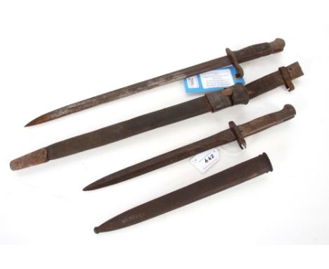 Two relic bayonets with scabbards including a U.S. 1917 example.&nbsp;This item can only be purchased by someone over the age