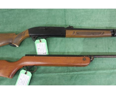 A B.S.A. Meteor .22 Cal. air rifle with a Crosman model 766 BB repeater / .177 air rifle (NB both AF). As a post 1939 air wea