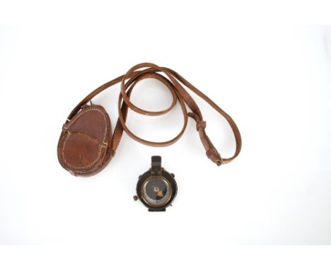 A very good WWI compass with maker marked leather case and dated 1917