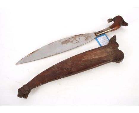 A Moro Barong sword with wooden scabbard, South East Asia. This item can only be purchased by someone over the age of 18 and 