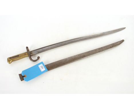 A French M1866 brass hilted sabre bayonet with scabbard. This item can only be purchased by someone over the age of 18 and ID
