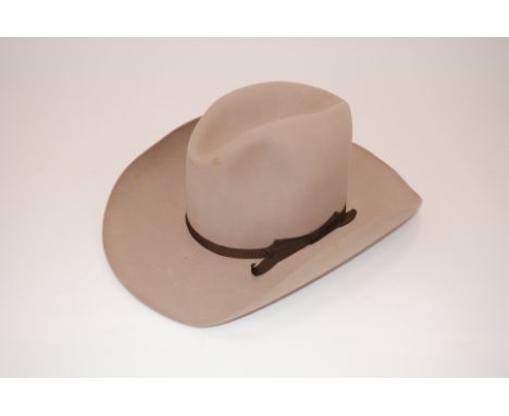 A Western style hat by Dunn & Co. Ltd, size 6 7/8th in original box 