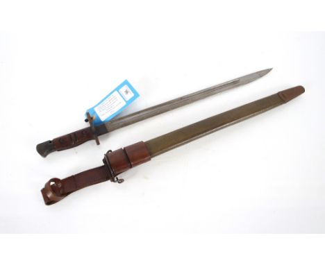A Remington M1917 bayonet with scabbard and leather frog. A better than average example.&nbsp;This item can only be purchased