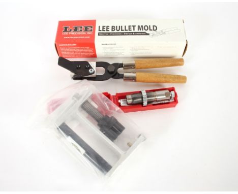 A boxed unused lee double cavity .454-140grn round ball mold with a .44 Cal. quick six revolver loading stand and a Lee decap