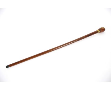 An R.A.F. interest walking stick with inset button and cap badge, inscription '1945 R.A.F. W/O Ronald Carter No.1620578, Welc