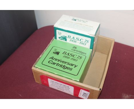 Two boxes of 12 bore cartridges B.A.S.C. 75 1908-1983 Anniversary issue, including a five colour example. This item can only 