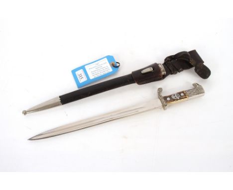 A Third Reich era police bayonet, by Paul Weyersberg & Co. Solingen, with leather frog and knot. This item can only be purcha