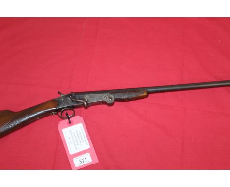 A .410 hammer shotgun with side lever opening N.V.S.N. A far better than most example with excellent bore. This item can only