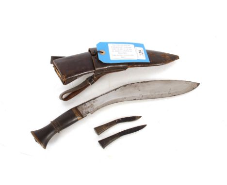 A Military style Kukri complete with frog etc. This item can only be purchased by someone over the age of 18 and ID verificat