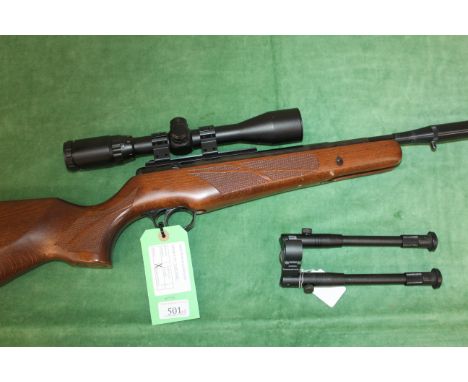 A B.S.A. .22 Cal. break barrel air rifle complete with sound moderator 3-9x40 scope and a bi-pod. As a post 1939 air weapon t
