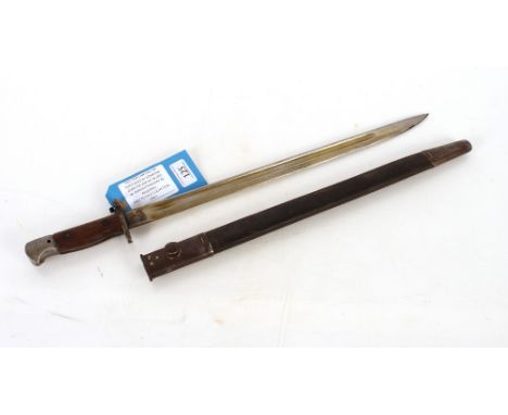 A British model 1907 bayonet by Wilkinson with scabbard, a better than most example. This item can only be purchased by someo