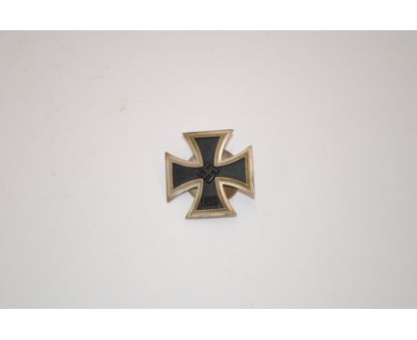 A fine Third Reich era Iron Cross First Class, with screw back and maker marked L/16