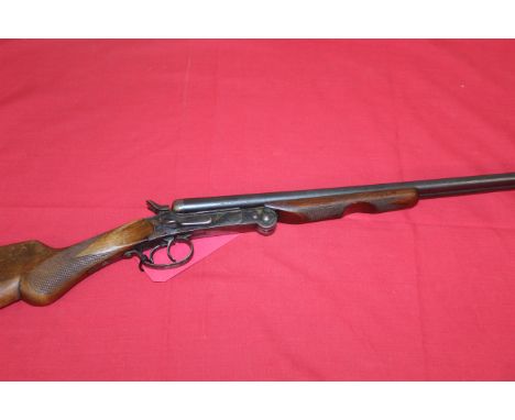 A .410 double barrel hammer shotgun Ser.No. AG-7101 with side lever opening (no maker marking) This item can only be purchase