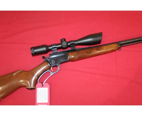 A Marlin .22 rim fire Cal. 39AS lever action rifle. Ser.No. 11150673 complete with a Nikko Sterling 12x44 scope. In overall g