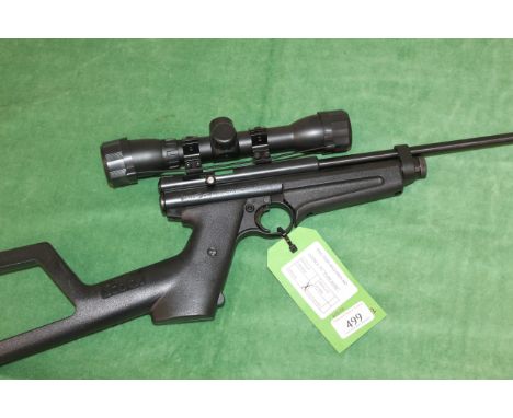 A Crosman model 2250XL .22 Cal. bolt action Co2 air rifle. Ser. No. D-16000576 complete with scope and slip in overall excell