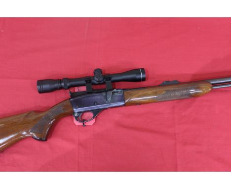 A Remington Speedmaster model S-52 self loading .22 rim fire Cal. rifle Ser. No.1729807 with a 3-9x32 scope. This item can on