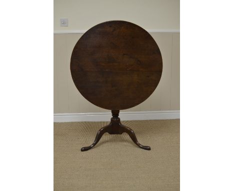 A Georgian oak Pillar Table with circular top on vase turned column and tripod base, 2ft 7in D