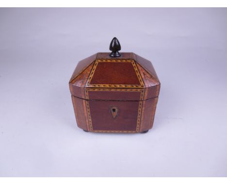A Scottish small mahogany octagonal Tea Caddy with chevron stringing and interior lid, 4 1/2in