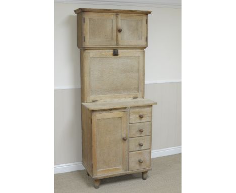 An unusual 'Quicksey' oak Kitchen Cabinet with pair of panelled doors enclosing memoranda, etc, fall front enclosing storage 