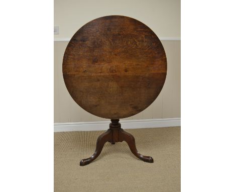 A Georgian oak Pillar Table with circular top on baluster turned column and tripod base, 2ft 10in D