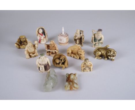 A collection of Japanese ivory Netsuke, early 20th Century, including a fine Meiji netsuke of a huge snake encoiling a monkey