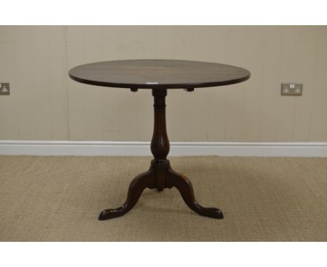 An antique oak Pillar Table with circular top on baluster column and tripod base, 2ft 10in