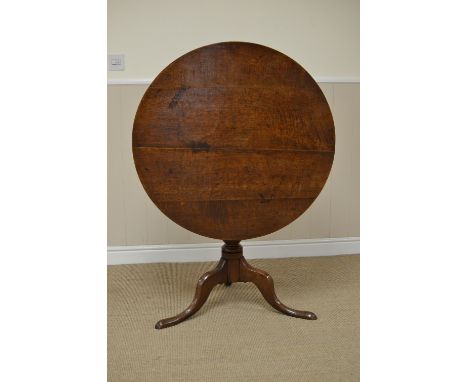 A Georgian oak Pillar Table with circular top on ring turned column and tripod base, 2ft 9in D