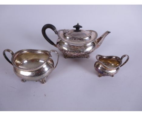 An Edward VII silver three piece Tea Service of oval form with gadroon rims, Sheffield 1903