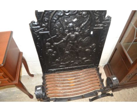 Cast iron fire back and accompanying grate