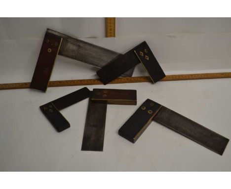 Box of various vintage wood working set squares