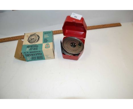 An Intrepid 3.5 inch fly reel together with one other