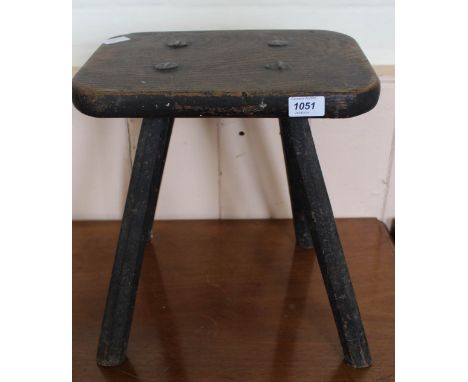 An 18th Century oak four legged stool