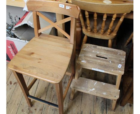 A modern pine bar stool and wooden steps