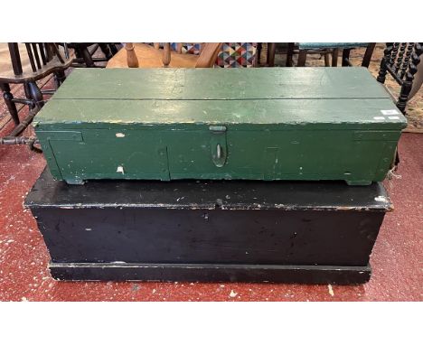 Pine trunk painted black together with a green WWII ammo box/trunk 