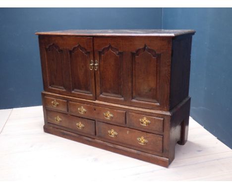 C18th oak dresser with four panel doors over 5 drawers on plinth base, 102Hx140cmW