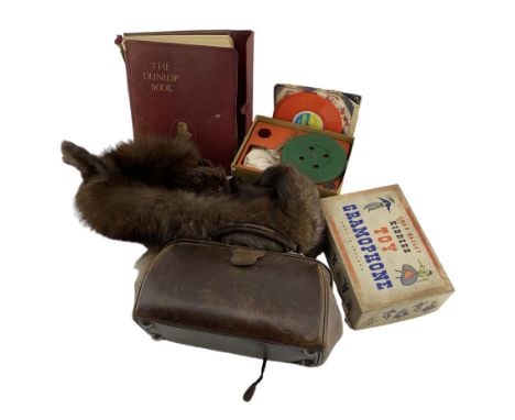 Small Gladstone bag, Mink stole, The Dunlop Book and Chad Valley Kiddies Toy Gramophone, boxed (4)