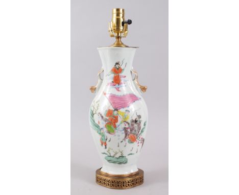 A EARLY 2OTH CENTURY CHINESE FAMILLE ROSE POCELAIN VASE / LAMP, with painted scenes of figures upon horseback, the reverse wi