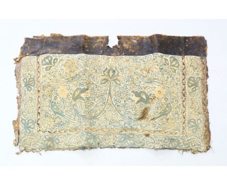 A 15TH-16TH CENTURY PERSIAN TIMURID EMBROIDED RED LEATHER PANEL, possibly from a horse saddle, 80cm x 52cm.