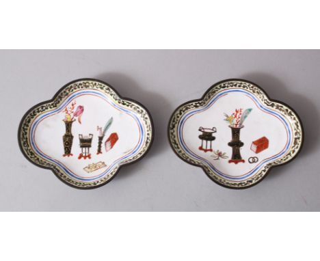 A PAIR OF 18TH CENTURY CHINESE CANTON ENAMEL DISHES, decorated with floral display and implements, 9.5cm x 8cm