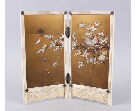 A JAPANESE MEIJI PERIOD IVORY &amp; SHIBAYAMA MINATURE TABLE SCREEN, the two fold screen with two gold lacquer panels inlaid 