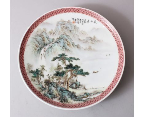 A CHINESE REPUBLICAN STYLE FAMILLE ROSE PORCELAIN HANGING DISH, with painted enamel landscape scenes, the top bearing chinese